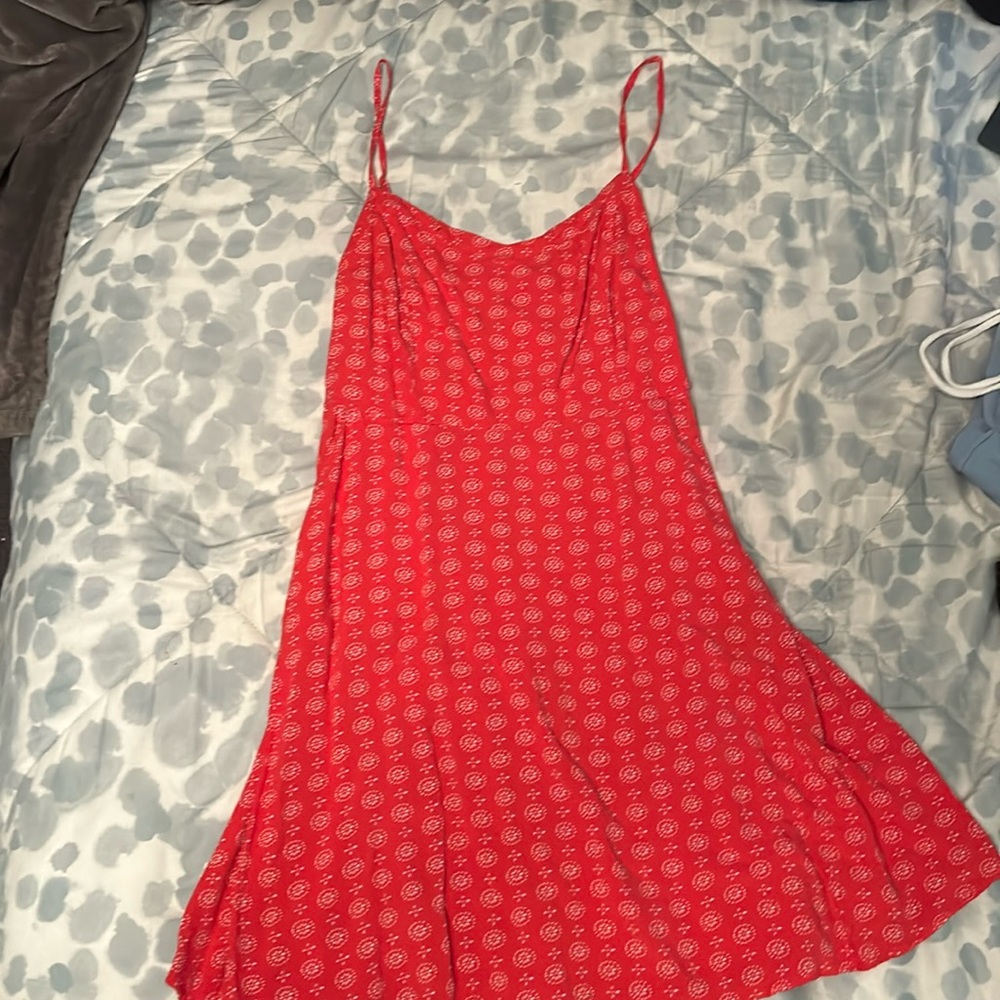 open back red dress with pockets.